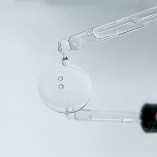 Niacinamide serum in dropper – lightweight formula that reduces dark spots, acne marks, and improves skin texture.